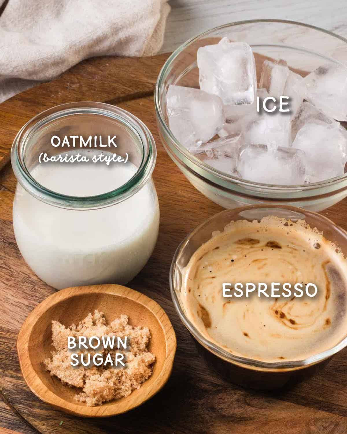 Labeled photo of espresso, brown sugar, ice, and oatmilk in bowls.